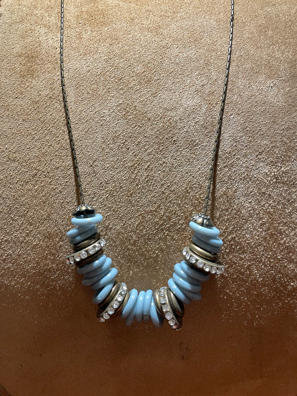 Blue glass beads with rhinestone rings